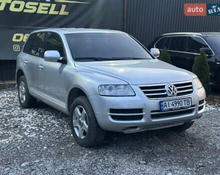 Серый Фольксваген Туарег, объемом двигателя 3.19 л и пробегом 350 тыс. км за 5700 $, фото 1 на Automoto.ua