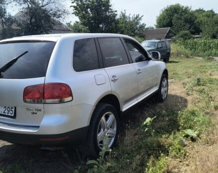 Сірий Фольксваген Туарег, об'ємом двигуна 5 л та пробігом 326 тис. км за 5800 $, фото 1 на Automoto.ua