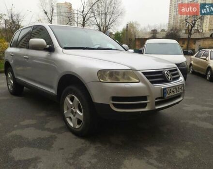 Серый Фольксваген Туарег, объемом двигателя 2.46 л и пробегом 300 тыс. км за 7499 $, фото 7 на Automoto.ua