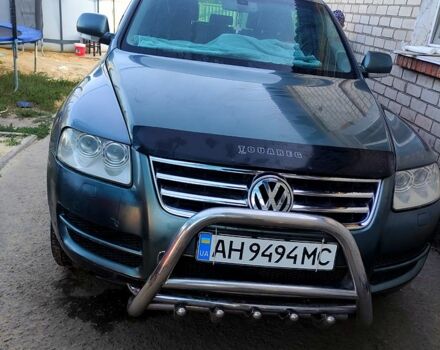 Серый Фольксваген Туарег, объемом двигателя 4.9 л и пробегом 260 тыс. км за 6000 $, фото 2 на Automoto.ua