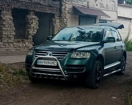 Серый Фольксваген Туарег, объемом двигателя 4.9 л и пробегом 260 тыс. км за 6000 $, фото 1 на Automoto.ua