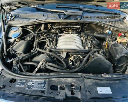 Серый Фольксваген Туарег, объемом двигателя 4.2 л и пробегом 310 тыс. км за 7400 $, фото 6 на Automoto.ua