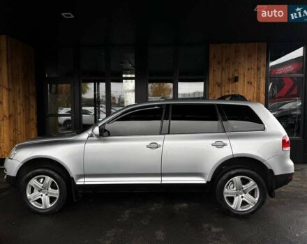 Серый Фольксваген Туарег, объемом двигателя 4.2 л и пробегом 309 тыс. км за 6999 $, фото 4 на Automoto.ua