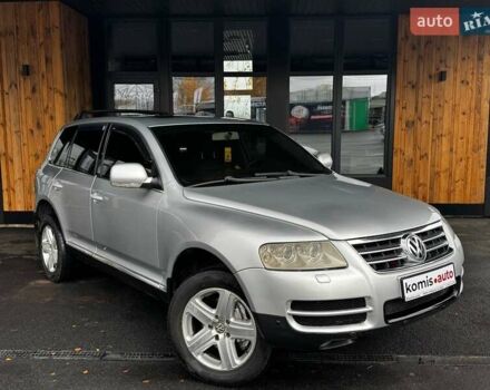 Серый Фольксваген Туарег, объемом двигателя 4.2 л и пробегом 309 тыс. км за 6999 $, фото 1 на Automoto.ua