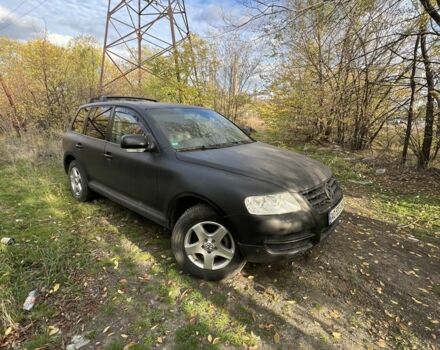 Серый Фольксваген Туарег, объемом двигателя 2.5 л и пробегом 290 тыс. км за 6300 $, фото 1 на Automoto.ua