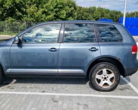 Серый Фольксваген Туарег, объемом двигателя 2.5 л и пробегом 315 тыс. км за 3800 $, фото 1 на Automoto.ua