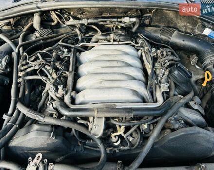 Серый Фольксваген Туарег, объемом двигателя 4.2 л и пробегом 310 тыс. км за 7400 $, фото 7 на Automoto.ua