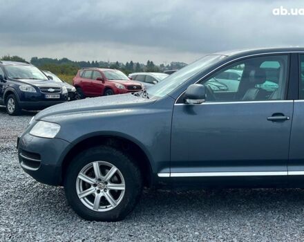 Серый Фольксваген Туарег, объемом двигателя 2.5 л и пробегом 333 тыс. км за 7440 $, фото 2 на Automoto.ua