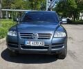 Серый Фольксваген Туарег, объемом двигателя 3.19 л и пробегом 503 тыс. км за 7700 $, фото 1 на Automoto.ua