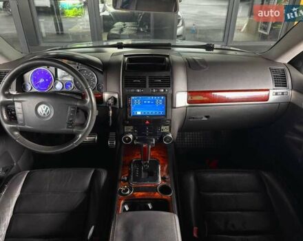 Серый Фольксваген Туарег, объемом двигателя 4.2 л и пробегом 309 тыс. км за 6999 $, фото 2 на Automoto.ua