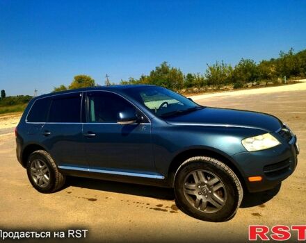 Серый Фольксваген Туарег, объемом двигателя 4.2 л и пробегом 355 тыс. км за 9500 $, фото 4 на Automoto.ua