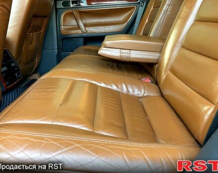 Серый Фольксваген Туарег, объемом двигателя 3.2 л и пробегом 308 тыс. км за 9500 $, фото 9 на Automoto.ua