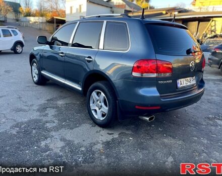 Серый Фольксваген Туарег, объемом двигателя 3.2 л и пробегом 308 тыс. км за 9500 $, фото 3 на Automoto.ua