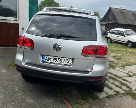 Серый Фольксваген Туарег, объемом двигателя 2.97 л и пробегом 400 тыс. км за 9300 $, фото 7 на Automoto.ua