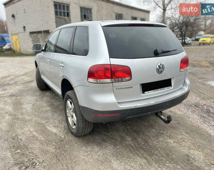 Серый Фольксваген Туарег, объемом двигателя 3 л и пробегом 340 тыс. км за 5500 $, фото 5 на Automoto.ua