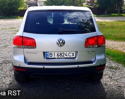 Сірий Фольксваген Туарег, об'ємом двигуна 3 л та пробігом 385 тис. км за 8500 $, фото 3 на Automoto.ua