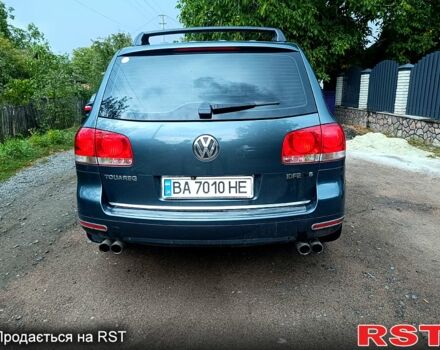 Серый Фольксваген Туарег, объемом двигателя 3.2 л и пробегом 300 тыс. км за 8500 $, фото 8 на Automoto.ua