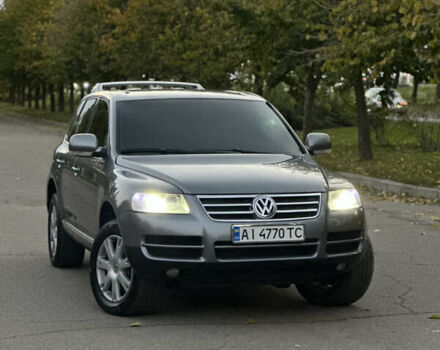 Серый Фольксваген Туарег, объемом двигателя 3 л и пробегом 220 тыс. км за 8250 $, фото 4 на Automoto.ua