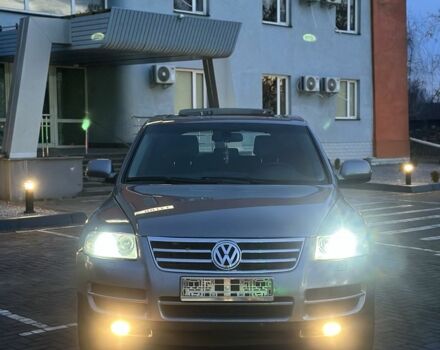 Серый Фольксваген Туарег, объемом двигателя 3 л и пробегом 340 тыс. км за 5350 $, фото 7 на Automoto.ua