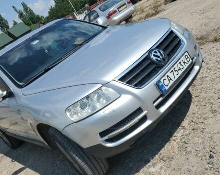 Серый Фольксваген Туарег, объемом двигателя 3 л и пробегом 290 тыс. км за 5800 $, фото 2 на Automoto.ua