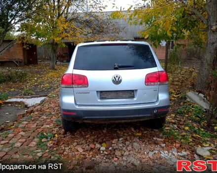 Серый Фольксваген Туарег, объемом двигателя 3.2 л и пробегом 400 тыс. км за 4900 $, фото 4 на Automoto.ua