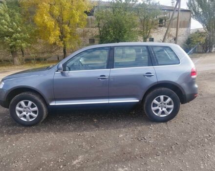 Серый Фольксваген Туарег, объемом двигателя 3 л и пробегом 450 тыс. км за 10900 $, фото 2 на Automoto.ua