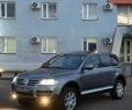 Серый Фольксваген Туарег, объемом двигателя 3 л и пробегом 340 тыс. км за 5350 $, фото 1 на Automoto.ua
