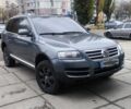 Серый Фольксваген Туарег, объемом двигателя 3 л и пробегом 320 тыс. км за 4200 $, фото 1 на Automoto.ua
