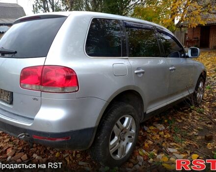 Серый Фольксваген Туарег, объемом двигателя 3.2 л и пробегом 400 тыс. км за 4900 $, фото 5 на Automoto.ua