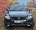 Серый Фольксваген Туарег, объемом двигателя 3 л и пробегом 1000 тыс. км за 5000 $, фото 1 на Automoto.ua
