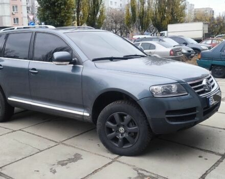 Серый Фольксваген Туарег, объемом двигателя 3 л и пробегом 320 тыс. км за 4200 $, фото 1 на Automoto.ua