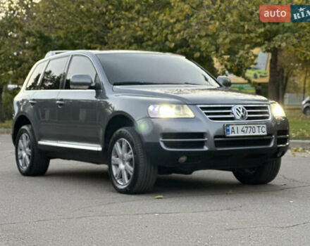 Серый Фольксваген Туарег, объемом двигателя 3 л и пробегом 220 тыс. км за 8250 $, фото 7 на Automoto.ua