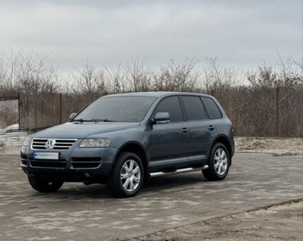 Серый Фольксваген Туарег, объемом двигателя 3 л и пробегом 502 тыс. км за 4000 $, фото 4 на Automoto.ua