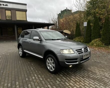 Серый Фольксваген Туарег, объемом двигателя 3 л и пробегом 370 тыс. км за 5450 $, фото 2 на Automoto.ua