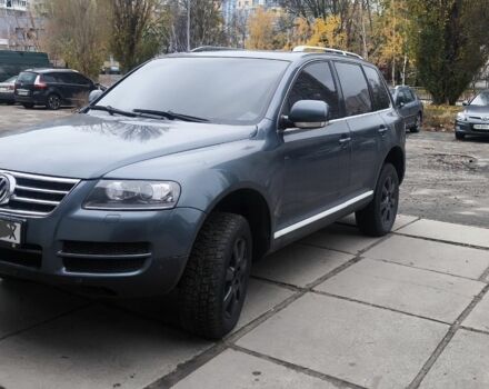 Серый Фольксваген Туарег, объемом двигателя 3 л и пробегом 320 тыс. км за 4200 $, фото 2 на Automoto.ua