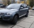 Серый Фольксваген Туарег, объемом двигателя 3 л и пробегом 320 тыс. км за 4200 $, фото 2 на Automoto.ua