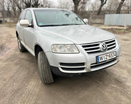 Серый Фольксваген Туарег, объемом двигателя 3 л и пробегом 340 тыс. км за 5500 $, фото 1 на Automoto.ua