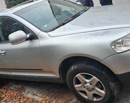 Сірий Фольксваген Туарег, об'ємом двигуна 3 л та пробігом 302 тис. км за 6402 $, фото 2 на Automoto.ua