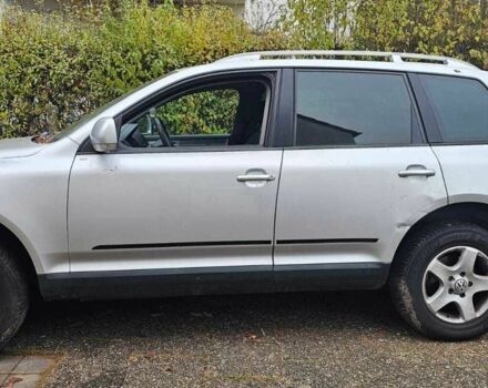Сірий Фольксваген Туарег, об'ємом двигуна 3 л та пробігом 302 тис. км за 6402 $, фото 1 на Automoto.ua