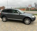 Сірий Фольксваген Туарег, об'ємом двигуна 3 л та пробігом 440 тис. км за 5900 $, фото 2 на Automoto.ua