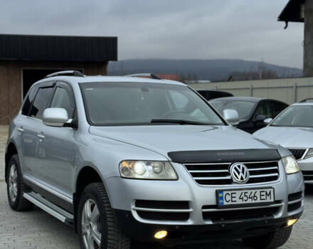 Серый Фольксваген Туарег, объемом двигателя 3 л и пробегом 295 тыс. км за 9700 $, фото 2 на Automoto.ua