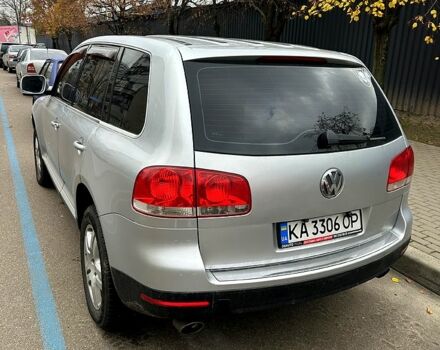 Сірий Фольксваген Туарег, об'ємом двигуна 3.2 л та пробігом 327 тис. км за 9500 $, фото 1 на Automoto.ua