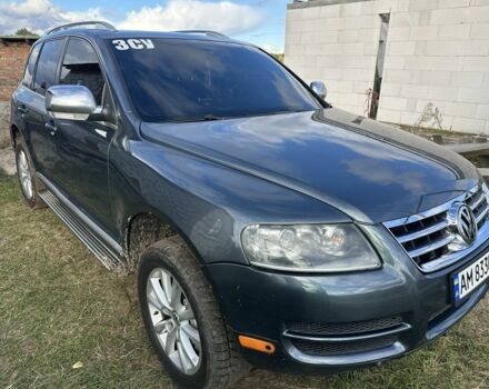 Серый Фольксваген Туарег, объемом двигателя 4.9 л и пробегом 327 тыс. км за 9200 $, фото 3 на Automoto.ua