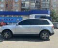 Серый Фольксваген Туарег, объемом двигателя 3 л и пробегом 250 тыс. км за 6500 $, фото 2 на Automoto.ua