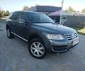 Сірий Фольксваген Туарег, об'ємом двигуна 3 л та пробігом 440 тис. км за 5900 $, фото 1 на Automoto.ua