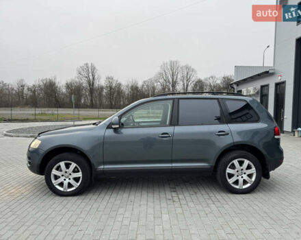 Сірий Фольксваген Туарег, об'ємом двигуна 3 л та пробігом 390 тис. км за 8700 $, фото 4 на Automoto.ua