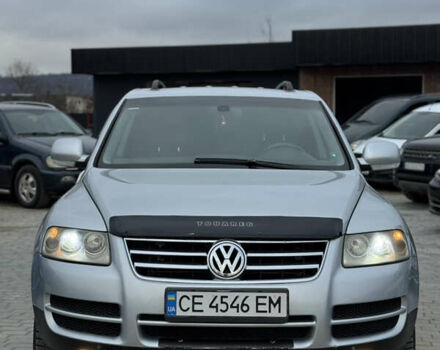 Серый Фольксваген Туарег, объемом двигателя 3 л и пробегом 295 тыс. км за 9700 $, фото 1 на Automoto.ua