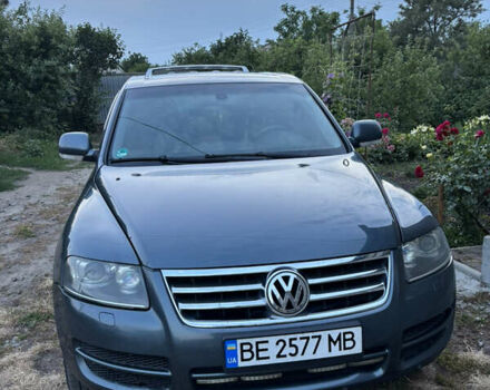 Серый Фольксваген Туарег, объемом двигателя 3 л и пробегом 406 тыс. км за 11500 $, фото 4 на Automoto.ua