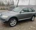 Серый Фольксваген Туарег, объемом двигателя 3 л и пробегом 270 тыс. км за 5700 $, фото 1 на Automoto.ua