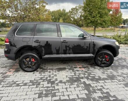 Серый Фольксваген Туарег, объемом двигателя 3 л и пробегом 230 тыс. км за 10500 $, фото 4 на Automoto.ua